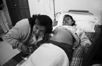 Latin Provider Giving Pregnant Woman a Checkup